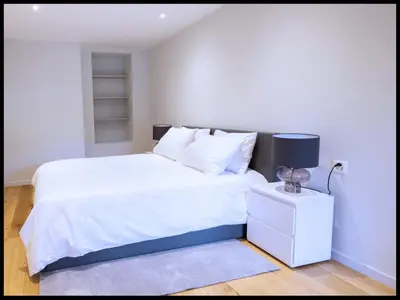 Ein Bett oder Betten in einem Zimmer der Unterkunft Visp Chic for 2