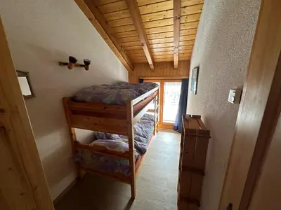 Ein Bett oder Betten in einem Zimmer der Unterkunft Chevreuil 28