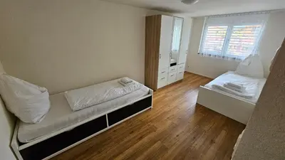 Ein Bett oder Betten in einem Zimmer der Unterkunft GARDEN