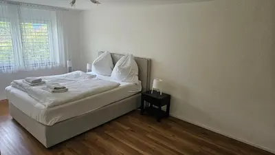 Ein Bett oder Betten in einem Zimmer der Unterkunft GARDEN