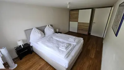 Ein Bett oder Betten in einem Zimmer der Unterkunft GARDEN