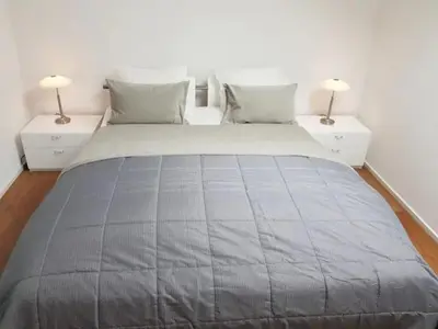 Ein Bett oder Betten in einem Zimmer der Unterkunft PENTHOUSE