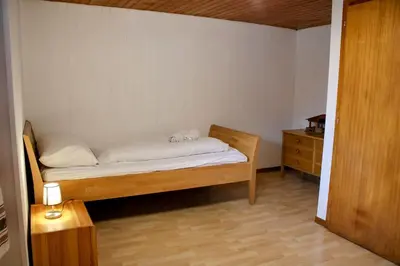 Ein Bett oder Betten in einem Zimmer der Unterkunft Alpine chalet apt w/parking and porch