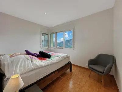 Ein Bett oder Betten in einem Zimmer der Unterkunft Family Mountain Hideway in the Swiss Alps