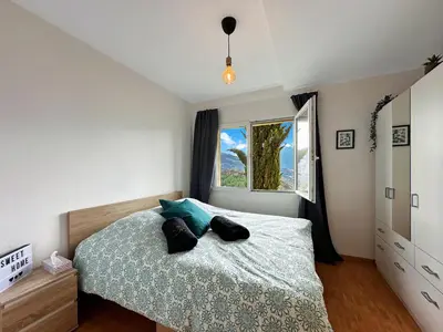 Ein Bett oder Betten in einem Zimmer der Unterkunft Family Mountain Hideway in the Swiss Alps