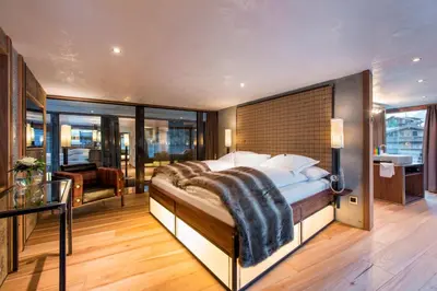 Ein Bett oder Betten in einem Zimmer der Unterkunft Luxury Loft by Heinz Julen