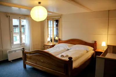 Ein Bett oder Betten in einem Zimmer der Unterkunft Family-friendly chalet apt with balcony