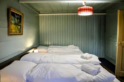 Ein Bett oder Betten in einem Zimmer der Unterkunft Family-friendly chalet apt with balcony