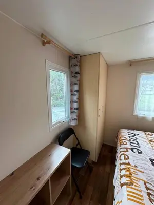 Ein Bett oder Betten in einem Zimmer der Unterkunft Cottage 4