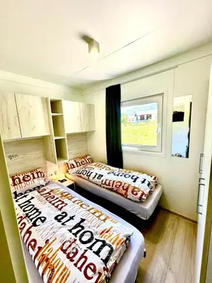 Ein Bett oder Betten in einem Zimmer der Unterkunft LuxCube 3