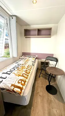 Ein Bett oder Betten in einem Zimmer der Unterkunft Cottage 2