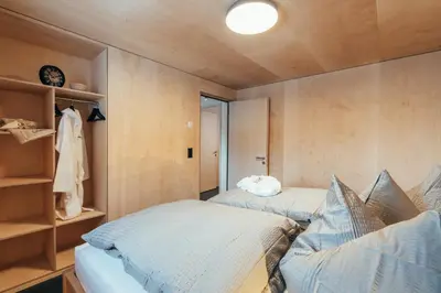 Ein Bett oder Betten in einem Zimmer der Unterkunft Giw Panorama Lodge 2000m