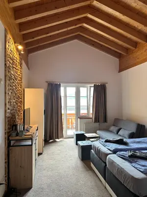 Ein Bett oder Betten in einem Zimmer der Unterkunft Touristenheim Bergfreude