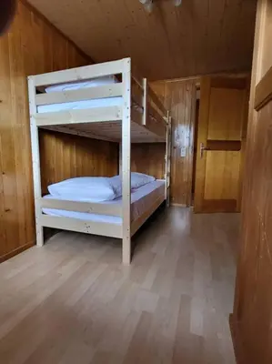 Ein Bett oder Betten in einem Zimmer der Unterkunft Chalet Engi Apt. 3 for up to 8 People