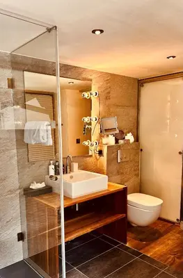Ein Badezimmer in der Unterkunft Self Check-In Chalet Rooms