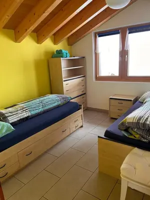 Ein Bett oder Betten in einem Zimmer der Unterkunft Chalet Adler Bettmeralp