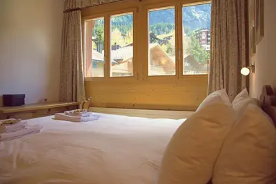 Ein Bett oder Betten in einem Zimmer der Unterkunft Chalet Bella Vista 12 - Penthouse