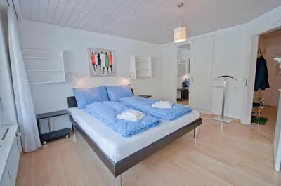 Ein Bett oder Betten in einem Zimmer der Unterkunft Haus Arola, Apartment Hirle