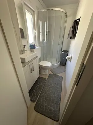 Ein Badezimmer in der Unterkunft LuxCube 5