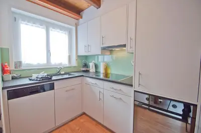 Küche/Küchenzeile in der Unterkunft Haus Bodmen B, Apartment Stellisee