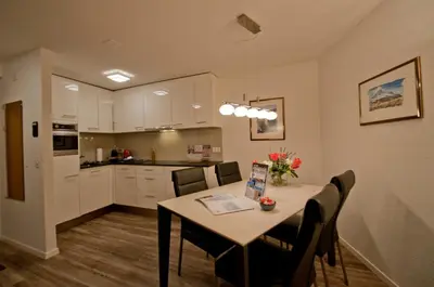 Küche/Küchenzeile in der Unterkunft Haus Bodmen C, Apartment Anemone