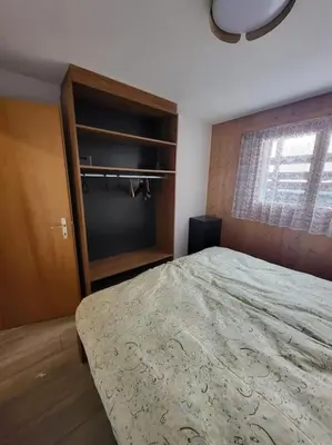 Ein Bett oder Betten in einem Zimmer der Unterkunft Appartement 3 pièces à Anzère