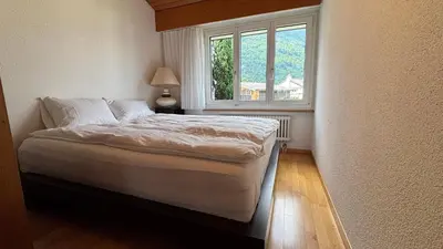 Ein Bett oder Betten in einem Zimmer der Unterkunft Garden Park Apartment