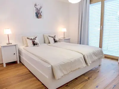 Ein Bett oder Betten in einem Zimmer der Unterkunft Apartment Bergluft by Interhome