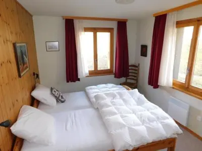 Ein Bett oder Betten in einem Zimmer der Unterkunft Ferienwohnung Fernblick