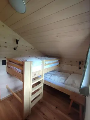 Ein Bett oder Betten in einem Zimmer der Unterkunft Chalet Männertreu OG