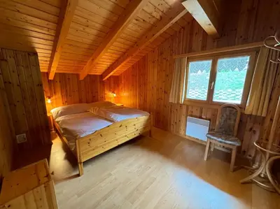 Ein Bett oder Betten in einem Zimmer der Unterkunft Chalet Siesta OG
