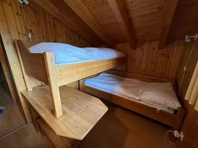 Ein Bett oder Betten in einem Zimmer der Unterkunft Chalet Siesta OG