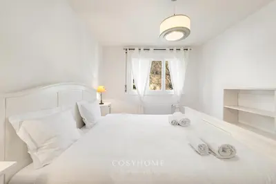 Ein Bett oder Betten in einem Zimmer der Unterkunft Le Maria l Vue splendide l By CosyHome
