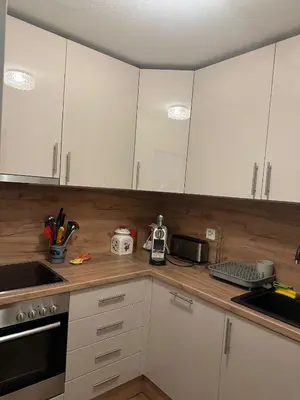 Küche/Küchenzeile in der Unterkunft Appartement avec grande terrasse Loèche les Bains