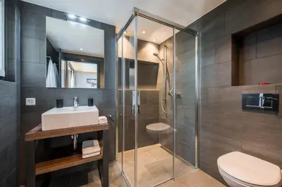 Ein Badezimmer in der Unterkunft Top Lage, viel Platz & Komfort by ZermattStays