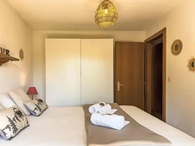 Ein Bett oder Betten in einem Zimmer der Unterkunft Apartment Chamois AZ10 by Interhome