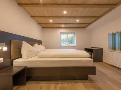 Ein Bett oder Betten in einem Zimmer der Unterkunft Apartment Haus Bergsonne by Interhome