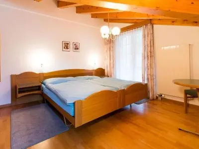 Ein Bett oder Betten in einem Zimmer der Unterkunft Apartment Haus Evita by Interhome