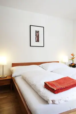 Ein Bett oder Betten in einem Zimmer der Unterkunft Apartment A32 by Interhome