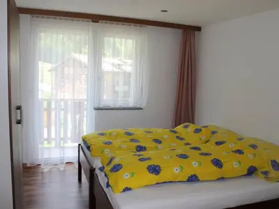 Ein Bett oder Betten in einem Zimmer der Unterkunft Apartment Weideli by Interhome