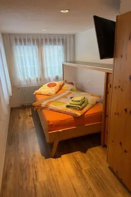 Ein Bett oder Betten in einem Zimmer der Unterkunft Apartment Mier Gfallt's by Interhome