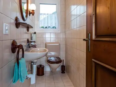 Ein Badezimmer in der Unterkunft Apartment Chalet Alpenrösli by Interhome