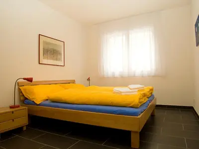 Ein Bett oder Betten in einem Zimmer der Unterkunft Apartment B33 by Interhome