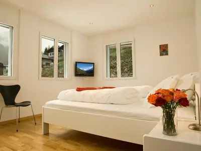 Ein Bett oder Betten in einem Zimmer der Unterkunft Apartment B41 by Interhome