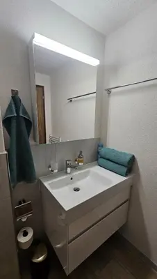 Ein Badezimmer in der Unterkunft Ferienwohnung GreenLook - Ferien am Lungernsee