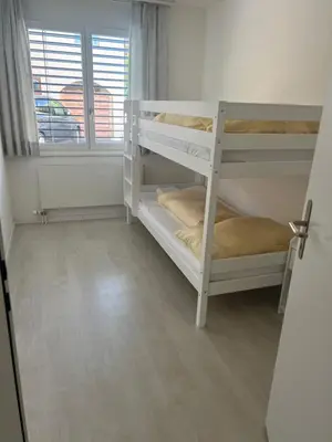 Ein Bett oder Betten in einem Zimmer der Unterkunft Apartment TOM