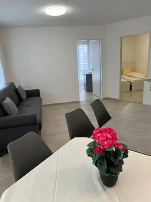 Ein Sitzbereich in der Unterkunft Apartment TOM