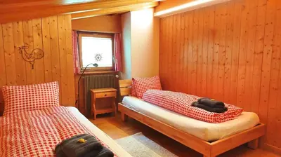 Ein Bett oder Betten in einem Zimmer der Unterkunft 5-Zimmerwohnung Zentral und nahe den Skipisten