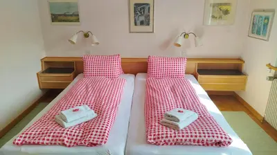 Ein Bett oder Betten in einem Zimmer der Unterkunft 5-Zimmerwohnung Zentral und nahe den Skipisten