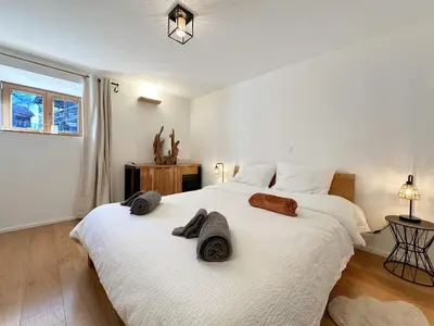 Ein Bett oder Betten in einem Zimmer der Unterkunft Pilanous Residence - Junior Suite - Swiss Alps
